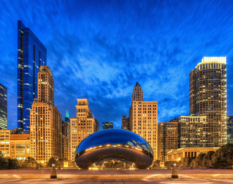 The Bean and the downtown Chicago skyline at dusk